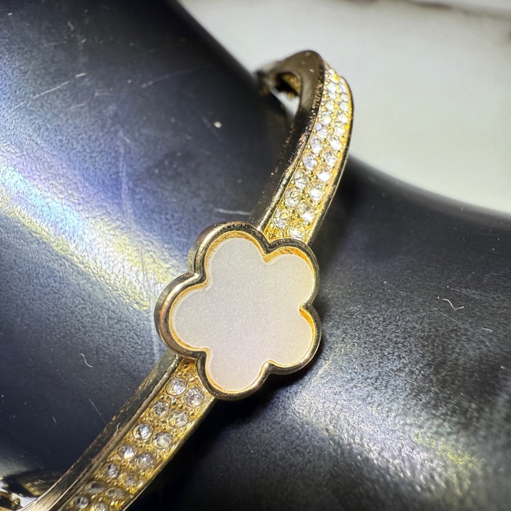Elegant Gold and White Floral Bracelet